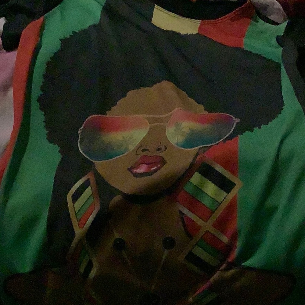 This is a pretty shirt that has been worn once or twice.